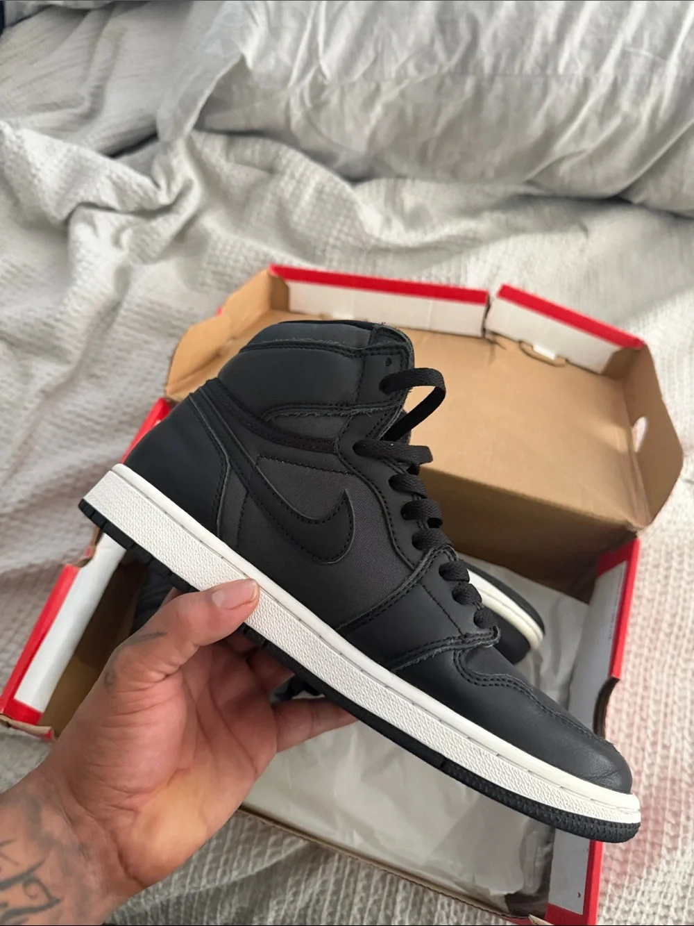Jordan Men’s High-Top Sneakers in Black with Red Accent